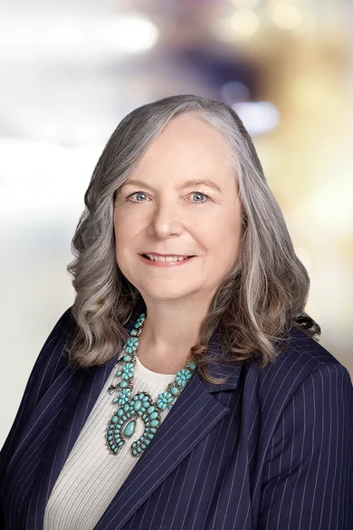 Portrait of Paula Fanning, REALTOR® | MRP | ABR® | CFSP | PSA | NRLUX.